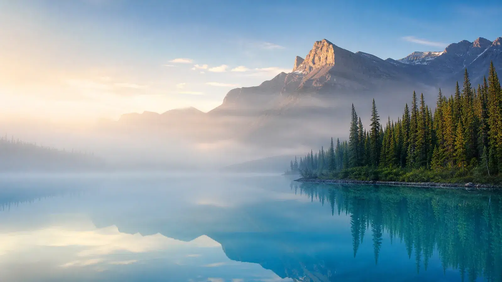 Canadian Rockies and turquoise alpine lake representing hope for cancer patients seeking resources