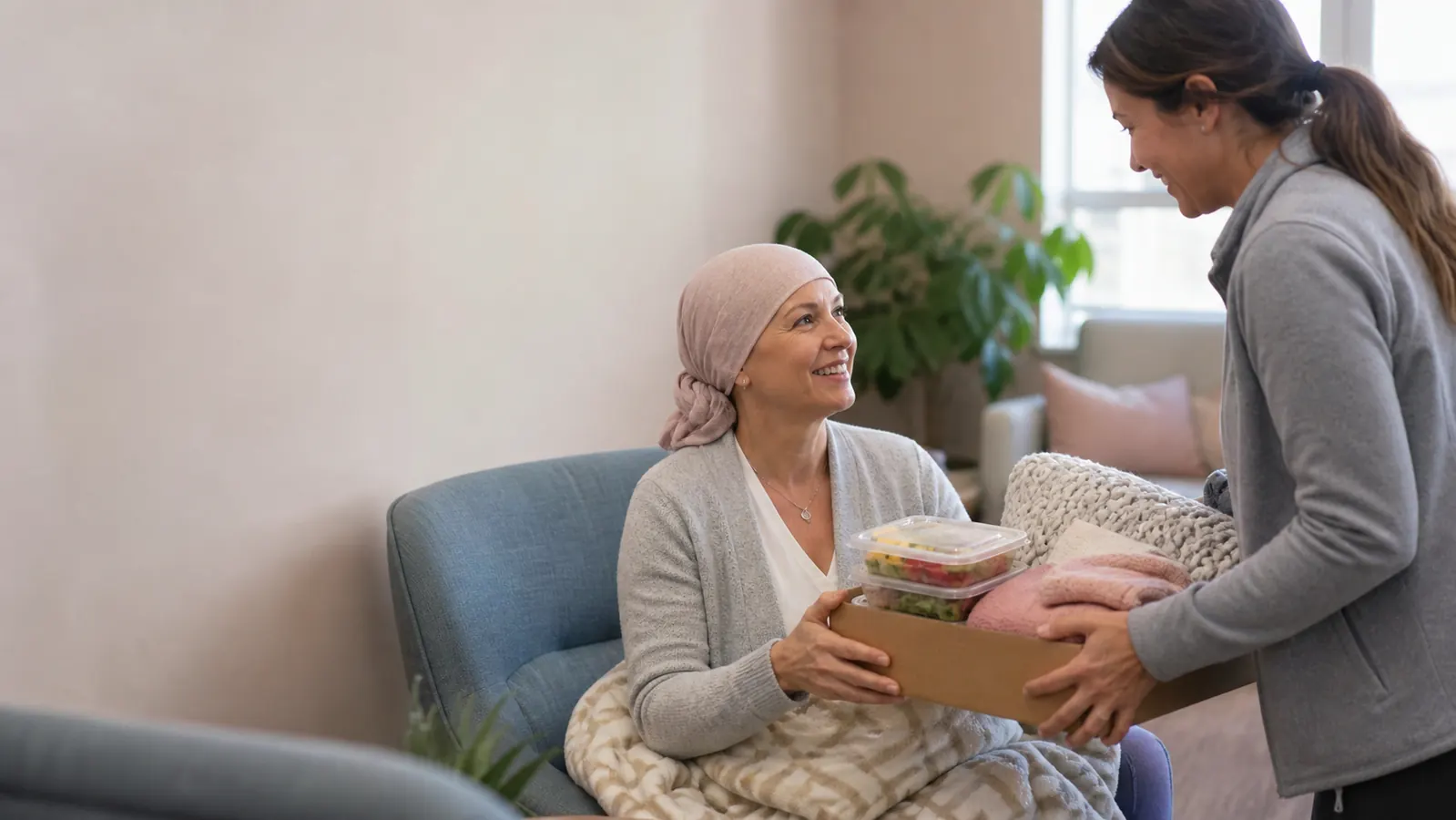 Cancer patient receiving a practical care package from a nonprofit volunteer